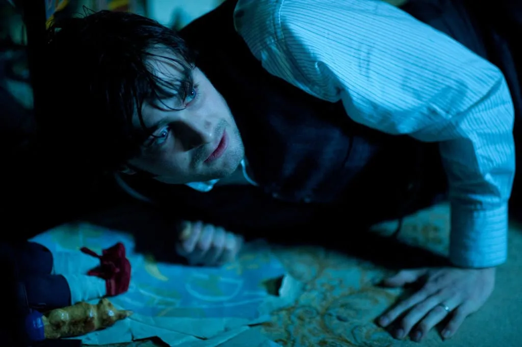 the woman in black image 1